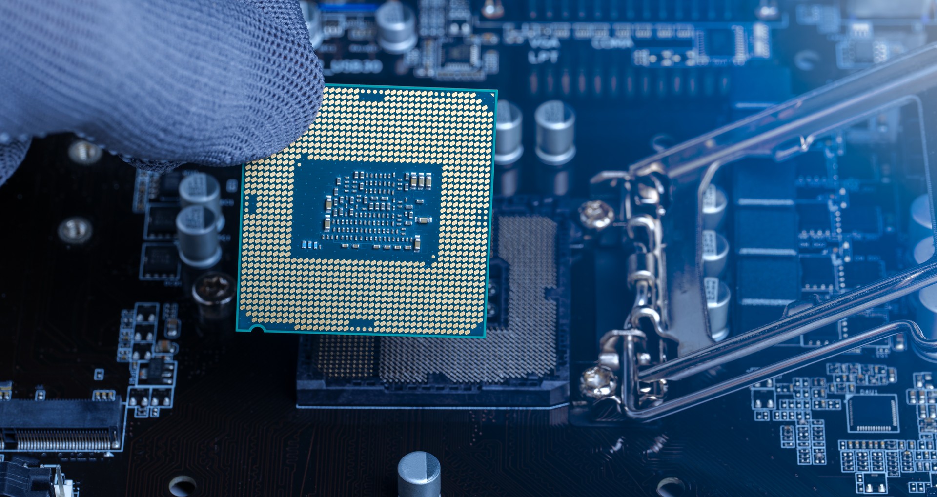 Central Processing Unit (CPU) Replacement by a repairman maintenance, updating the motherboard's hardware, microprocessor chipset, electronic engineering,